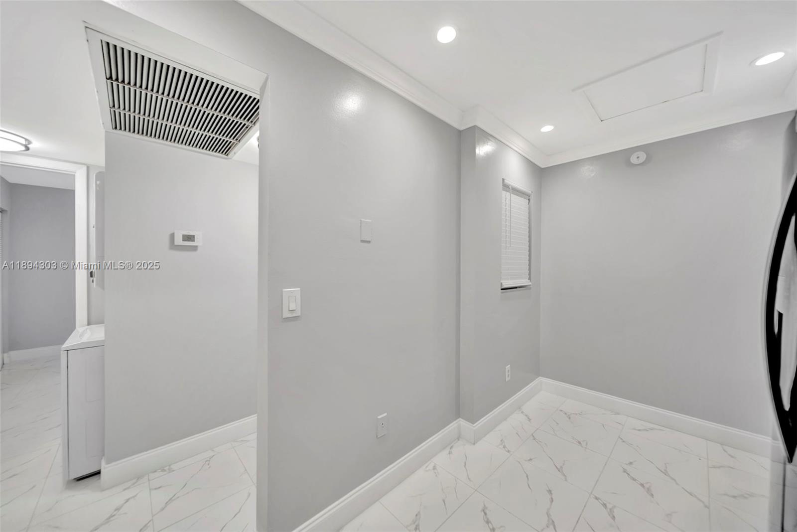 871 Northeast 207th Terrace, Unit 4202 Miami, FL 33179 - Photo 14 of 27 a view of a hallway