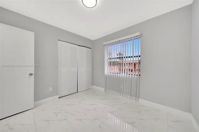 $225,000 | 871 Northeast 207th Terrace, Unit 4202, Miami, FL 33179