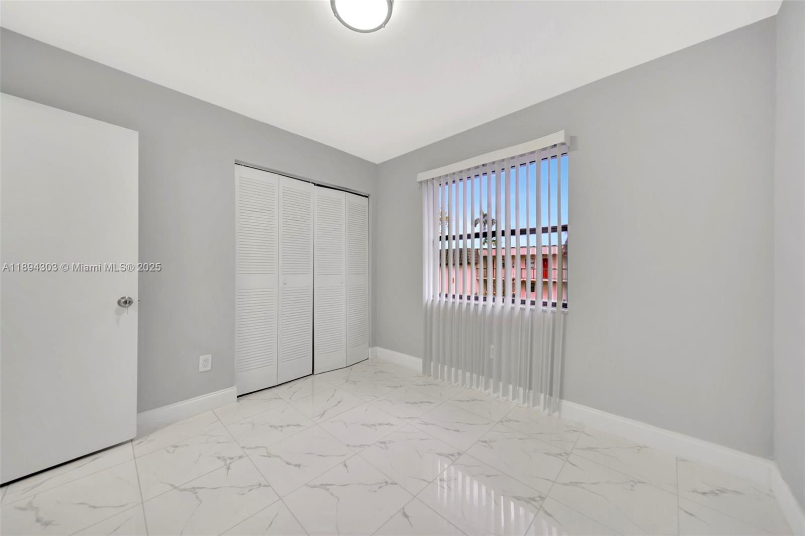 871 Northeast 207th Terrace, Unit 4202 Miami, FL 33179 - Photo 23 of 27 a view of an empty room