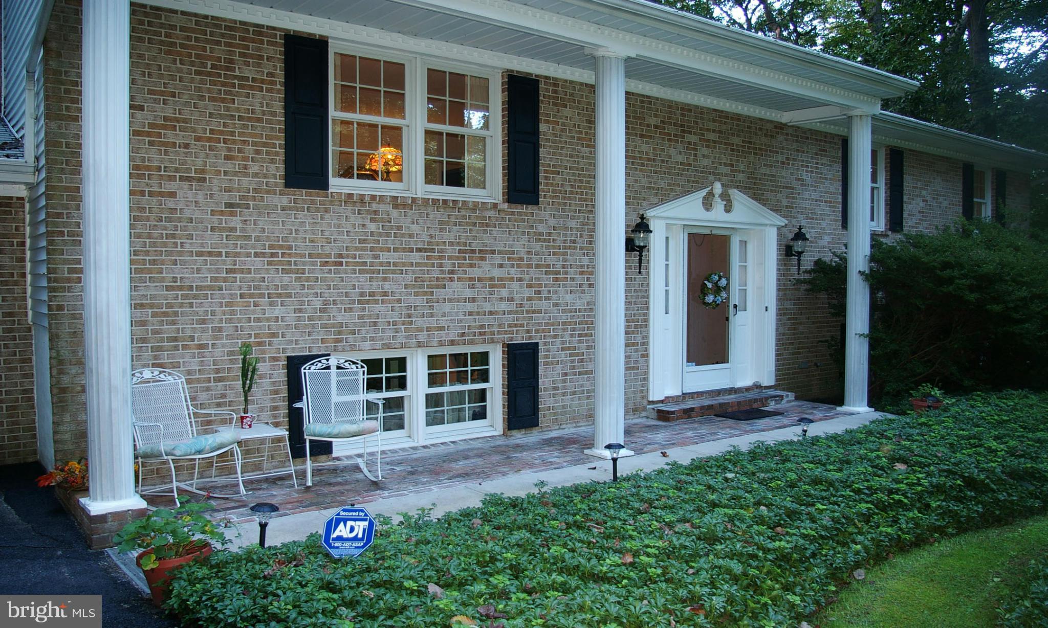 2012 Fallsgrove Way Fallston, MD 21047 - Photo 2 of 12 a front view of a house with a yard and outdoor seating