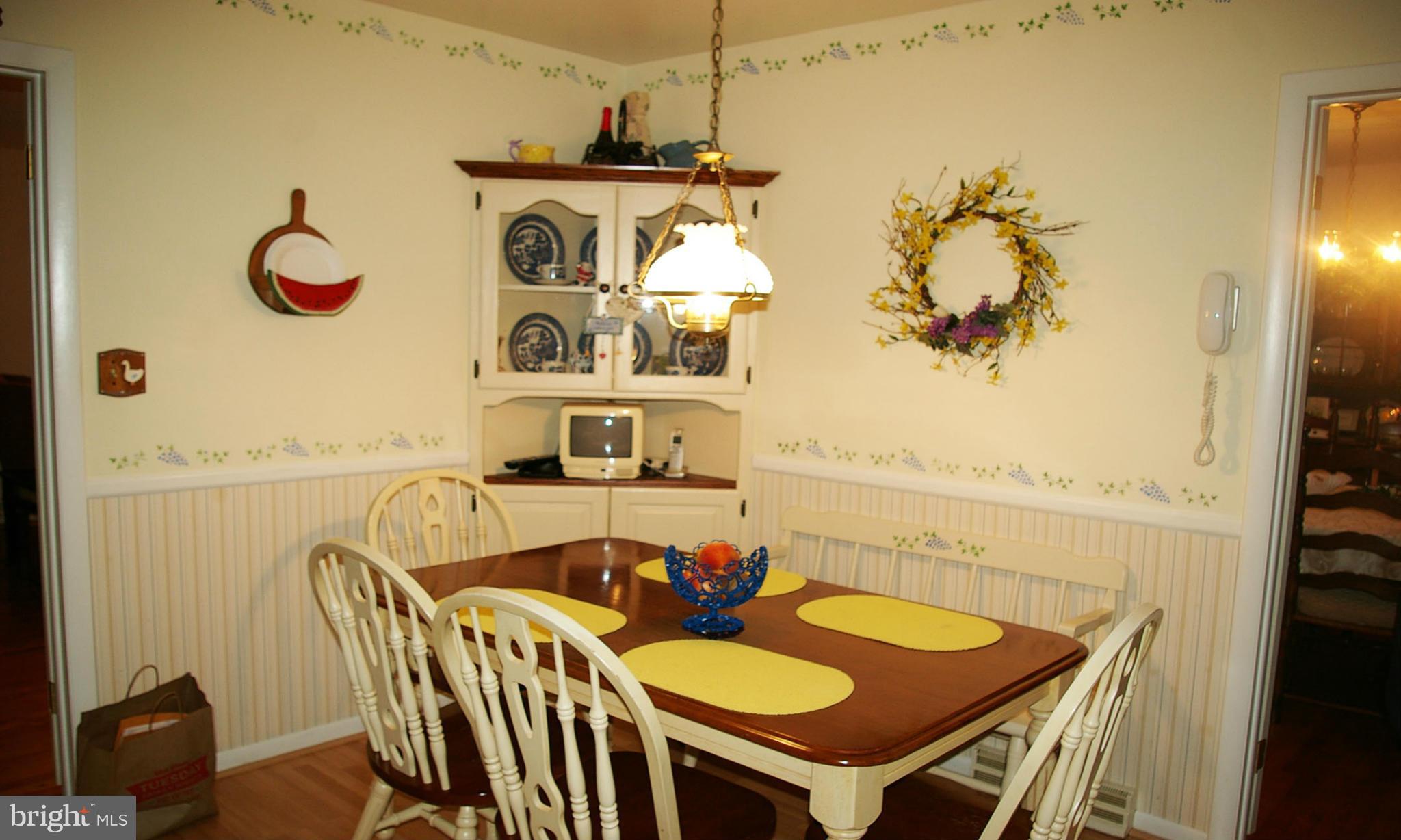2012 Fallsgrove Way Fallston, MD 21047 - Photo 4 of 12 a view of a dining room with furniture and wooden floor