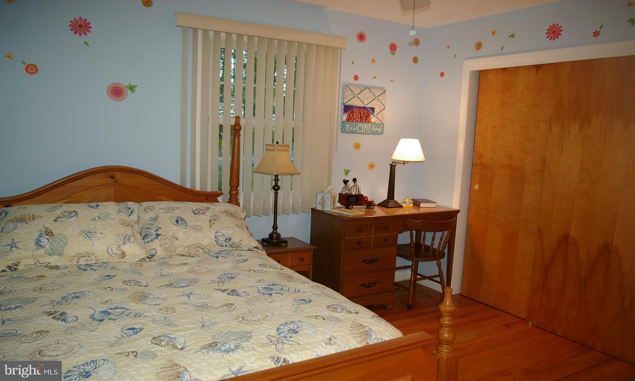 2012 Fallsgrove Way Fallston, MD 21047 - Photo 7 of 12 a bedroom with a bed and a dresser in it