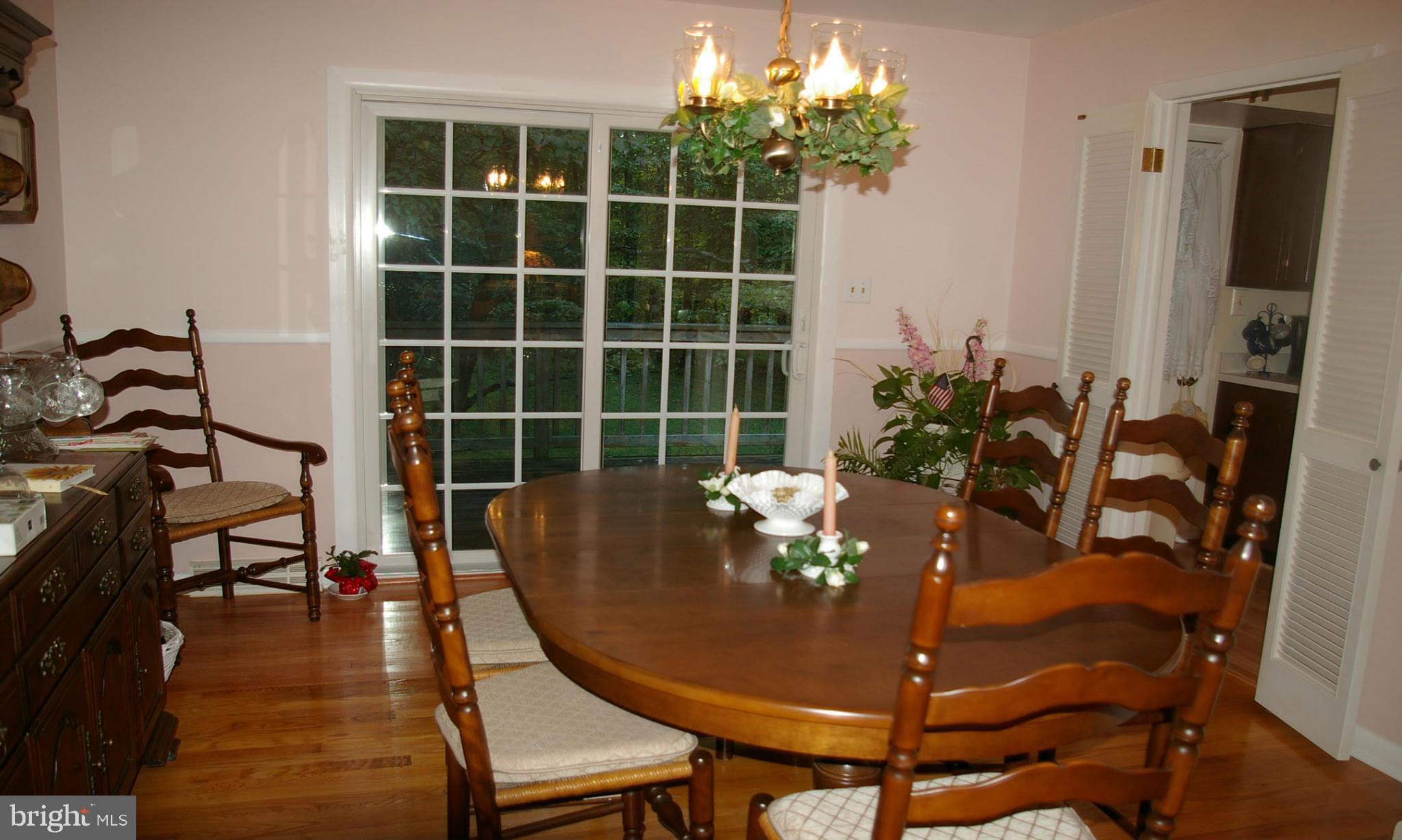 2012 Fallsgrove Way Fallston, MD 21047 - Photo 8 of 12 a view of a dining room with furniture window and wooden floor
