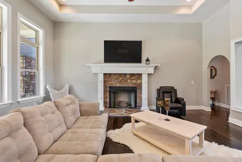 a kitchen with stainless steel appliances granite countertop a stove a sink and a granite counter tops