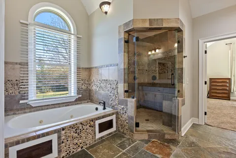 a room with furniture and a window