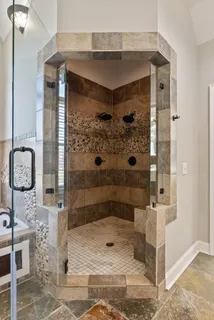 a bedroom with bed and wooden floor