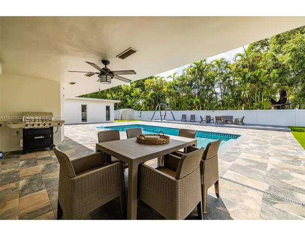 a view of an outdoor space with seating area