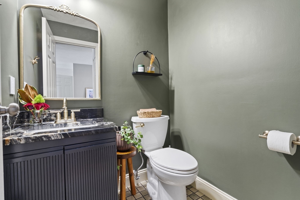 4 Apple Ridge Road, Unit 6 Maynard, MA 01754 - Photo 11 of 40 a bathroom with a toilet sink and mirror