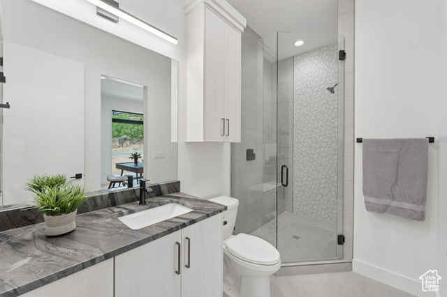 2280 East Outlaw Road, Unit 56 Kamas, UT 84036 - Photo 9 of 59 Bathroom featuring vanity, tile patterned flooring, a shower stall, and recessed lighting