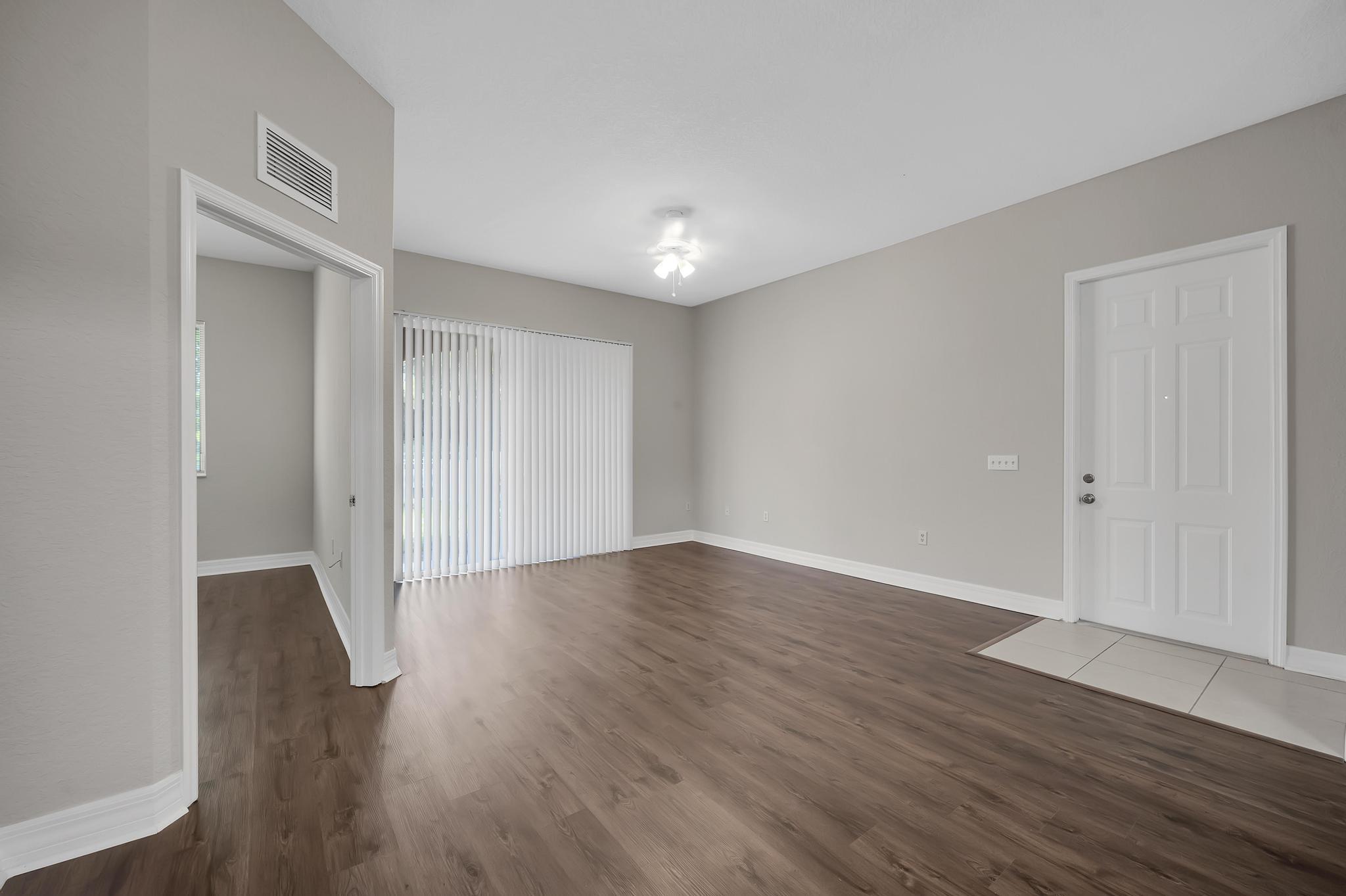 55 Southeast Palermo, Unit 106 Stuart, FL 34994 - Photo 15 of 39 a view of a room with wooden floor