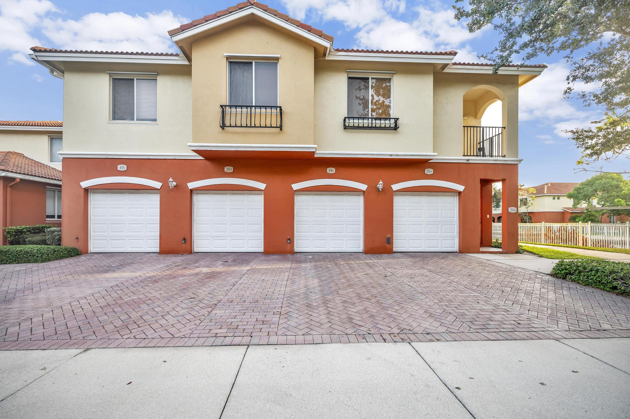 55 Southeast Palermo, Unit 106 Stuart, FL 34994 - Photo 2 of 39 a front view of a house
