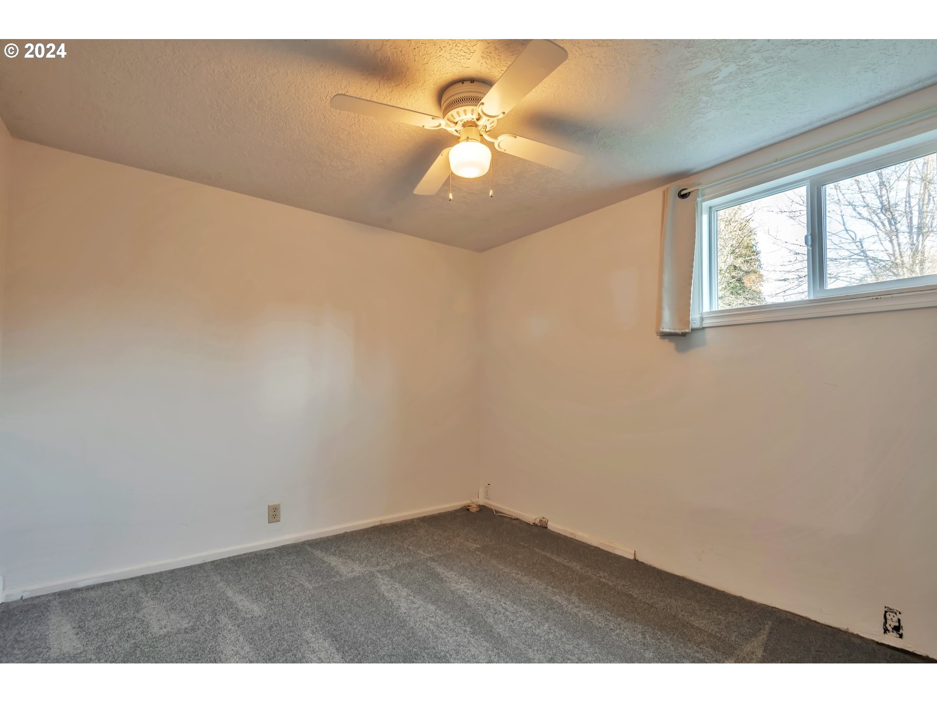 457 Southwest Forest Road Estacada, OR 97023 - Photo 16 of 31 a view of an empty room with a window