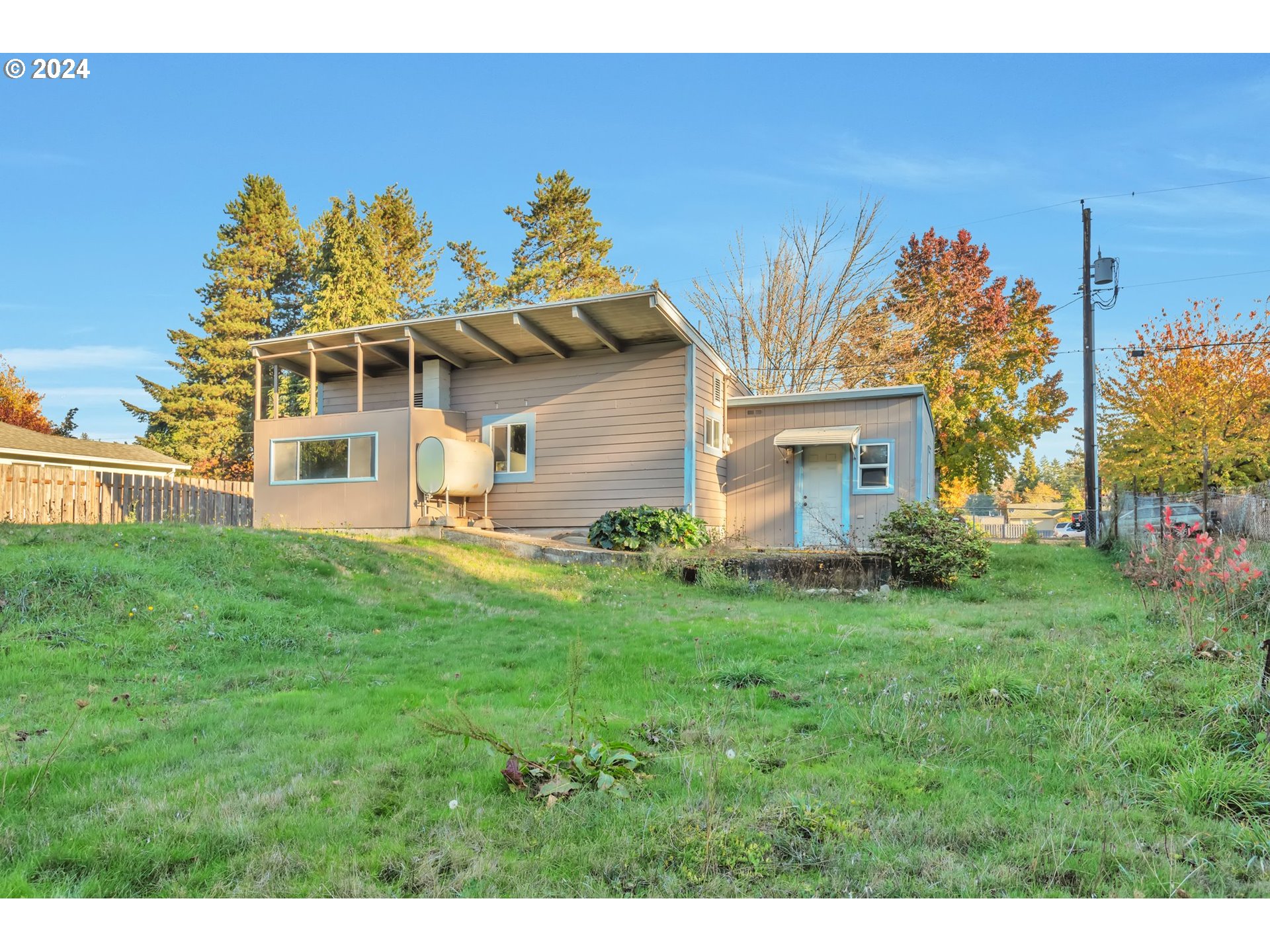 457 Southwest Forest Road Estacada, OR 97023 - Photo 25 of 31 a front view of a house with a garden
