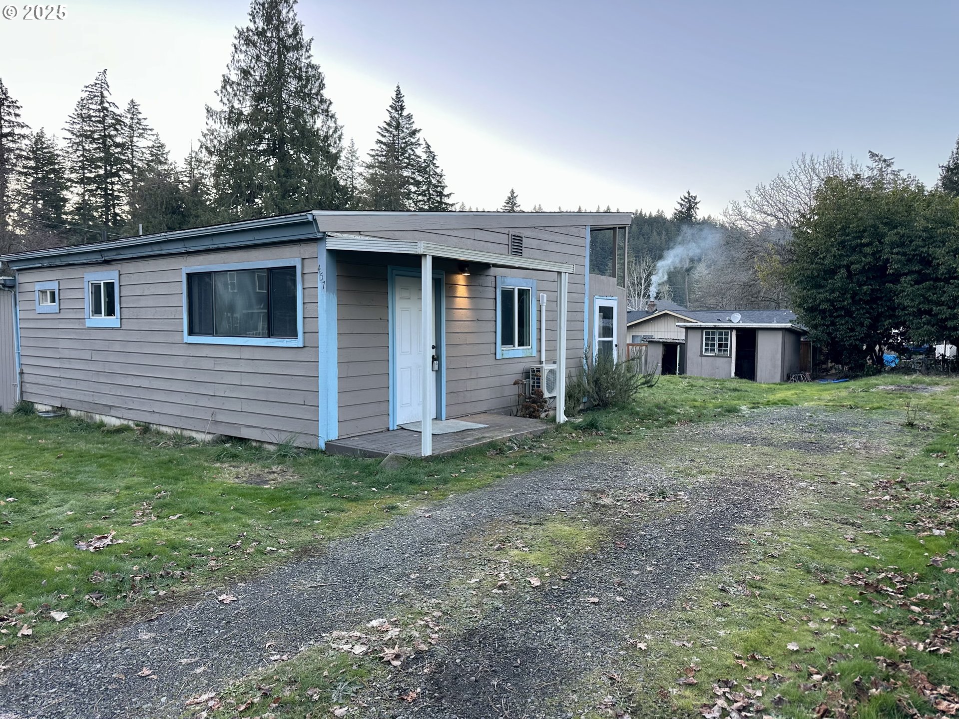 457 Southwest Forest Road Estacada, OR 97023 - Photo 31 of 31 a view of a house with a backyard