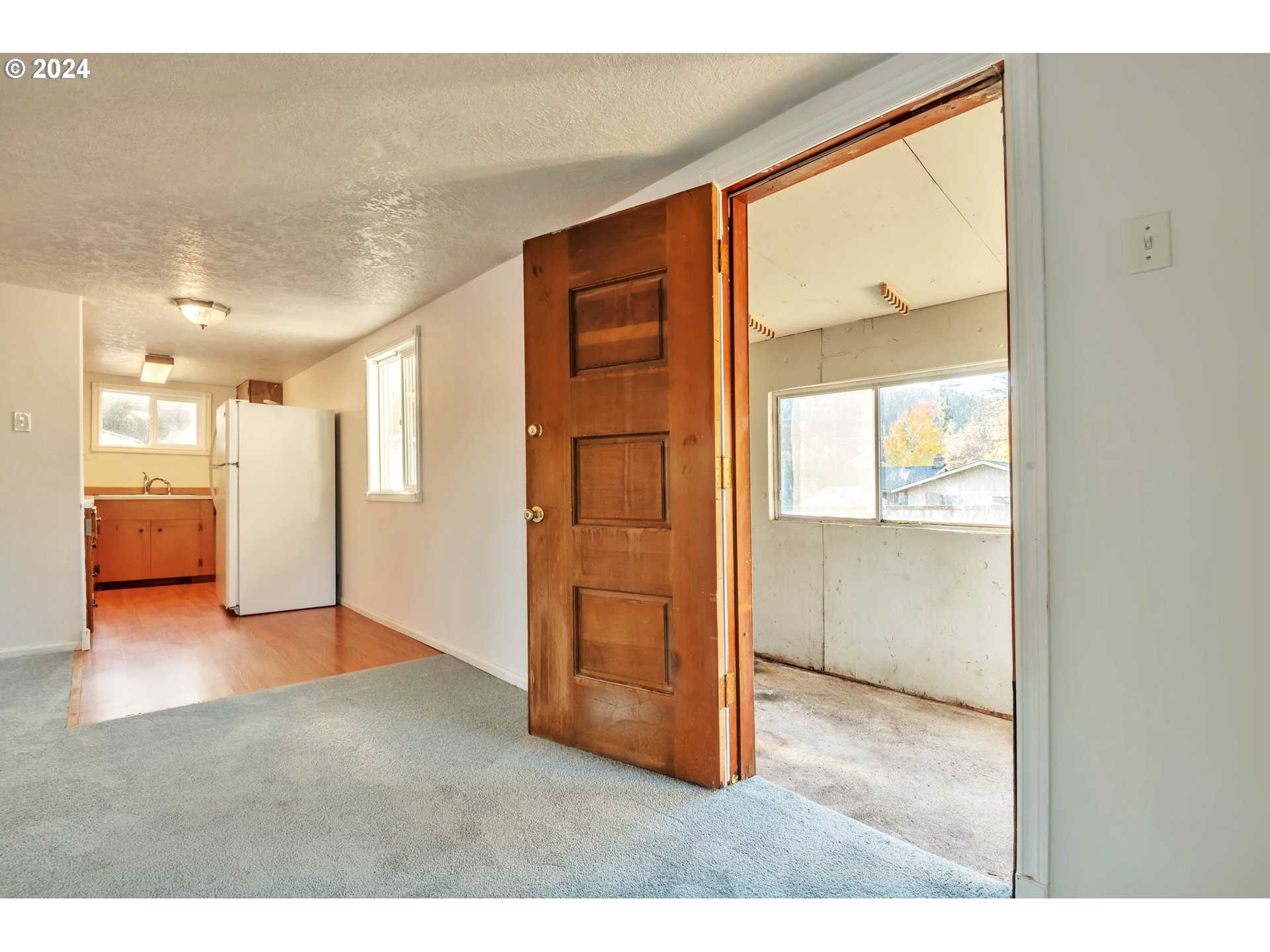 457 Southwest Forest Road Estacada, OR 97023 - Photo 10 of 31 a view of an empty room and a window