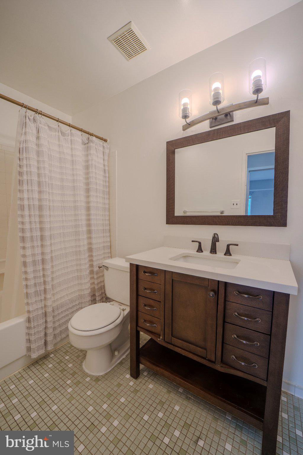 6147 Edsall Road, Unit N Alexandria, VA 22304 - Photo 22 of 28 Modern bathroom with elegant fixtures.