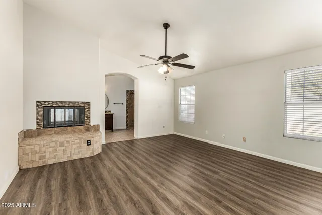 a view of a livingroom with wooden floor