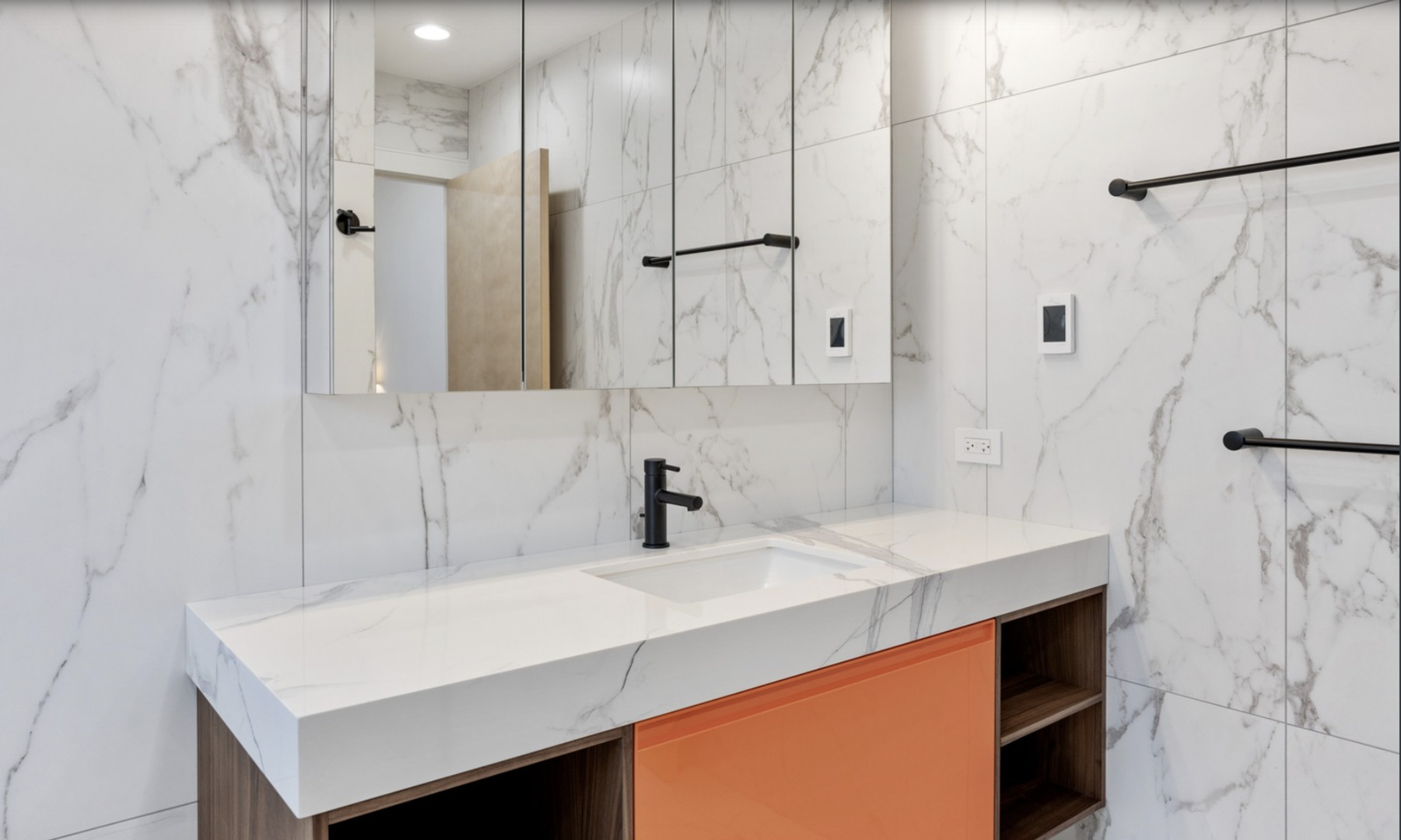 548 Exmoor Road Kenilworth, IL 60043 - Photo 11 of 19 a bathroom with a sink a mirror and a shower