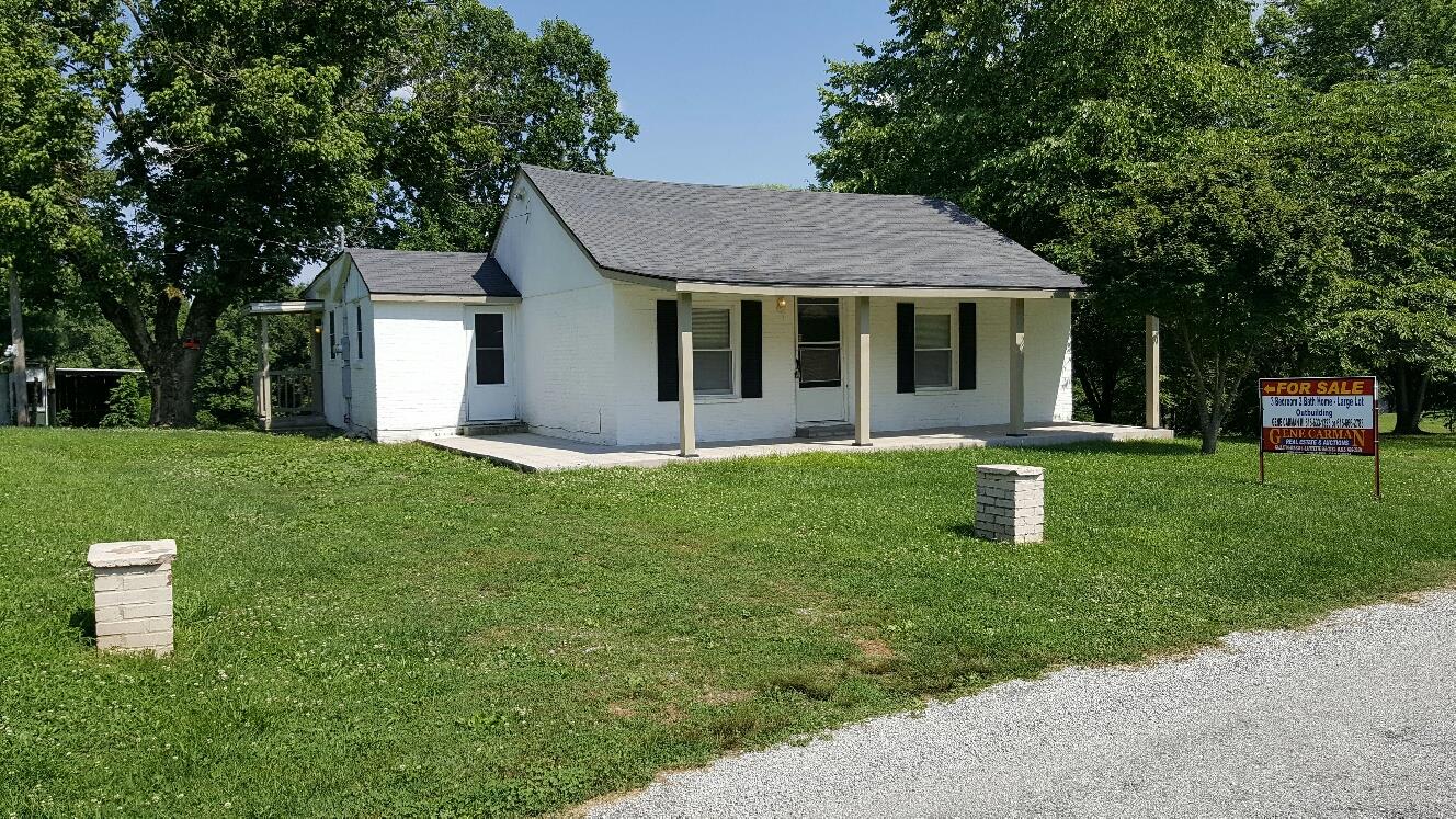 719 Highland Road Red Boiling Springs, TN 37150 - Photo 1 of 12 a view of a house with a yard and tree s