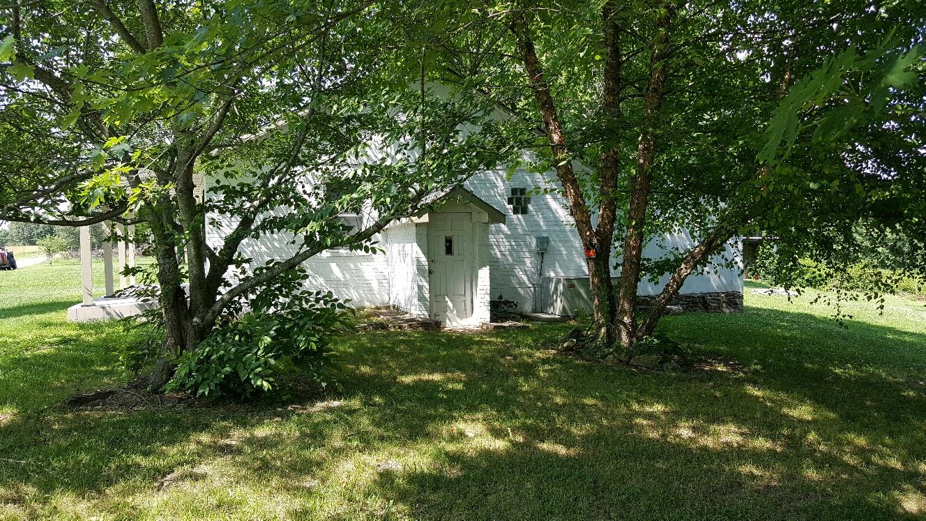 719 Highland Road Red Boiling Springs, TN 37150 - Photo 3 of 12 a view of a house with a tree