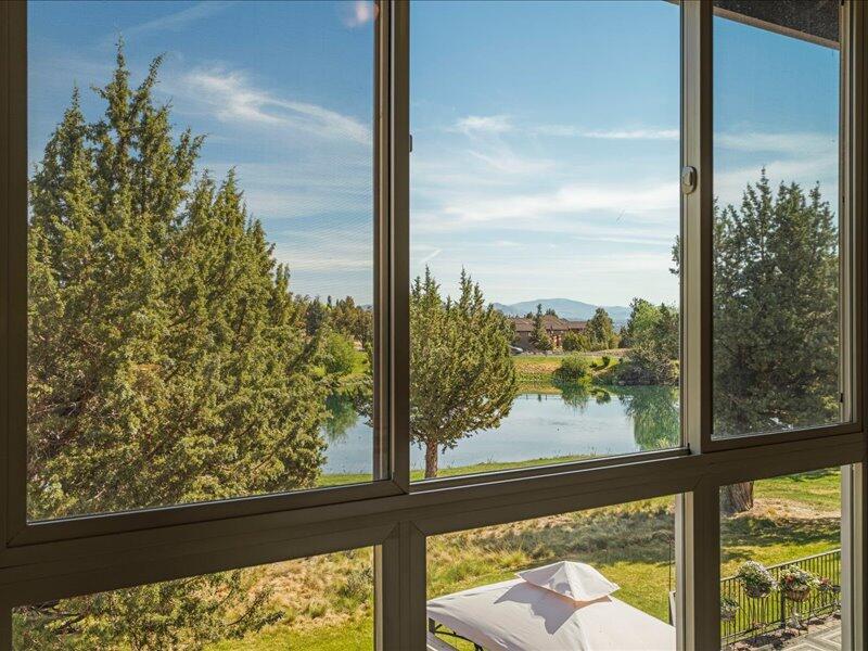 1378 Highland View Loop Redmond, OR 97756 - Photo 43 of 98 a view of a glass door with a tree