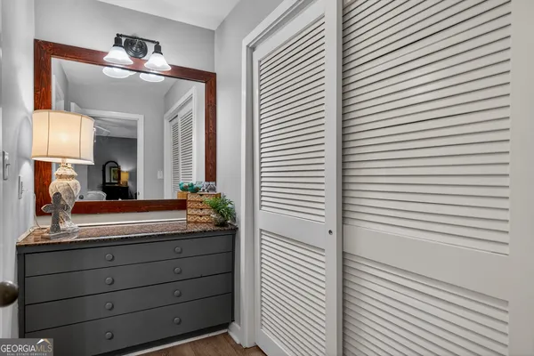 a bathroom with a double vanity sink and a mirror