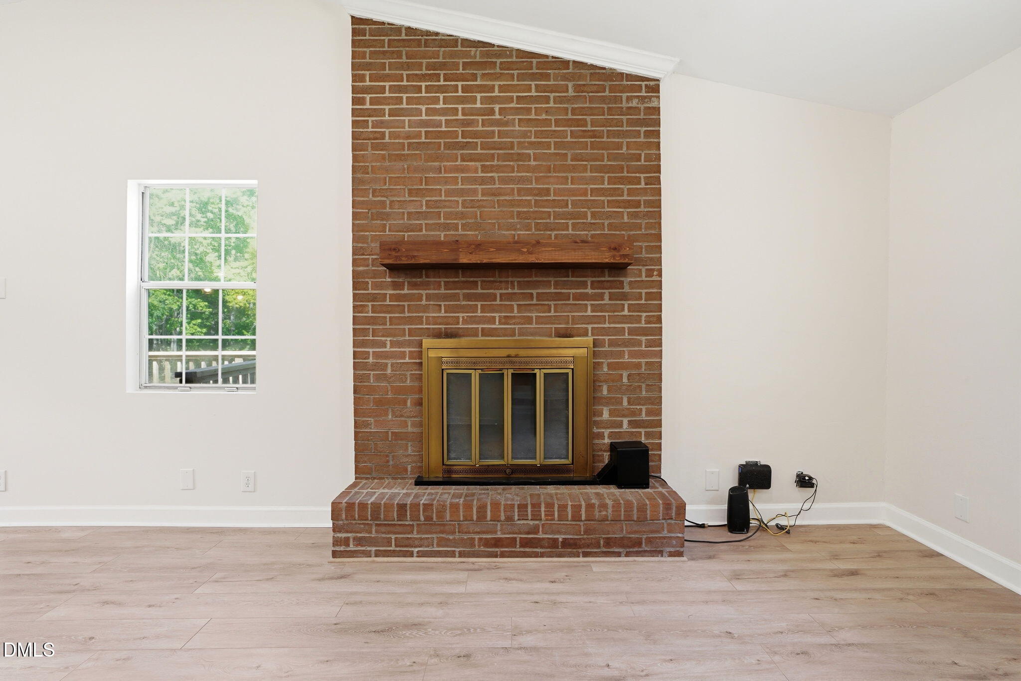 3602 Harrison Road Castalia, NC 27816 - Photo 26 of 48 a living room with furniture and a fireplace