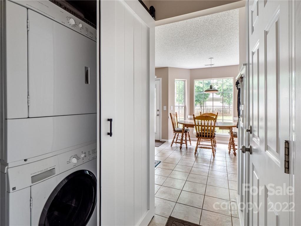 1663 Heather Glen Road Kannapolis, NC 28081 - Photo 16 of 30 a view of a hallway with dining area a livingroom and entryway