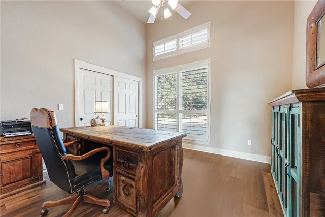 a dining room with furniture and window