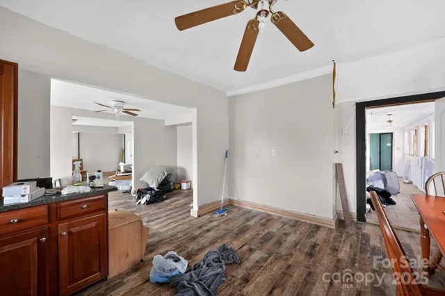 a bedroom with furniture and window
