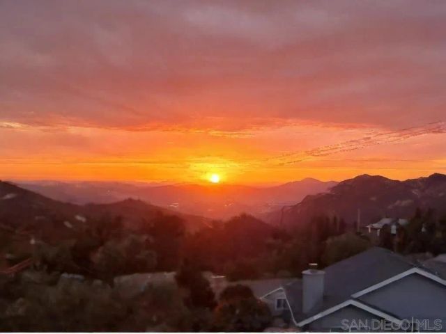 a view of a city with mountain