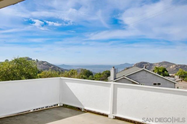 a kitchen with stainless steel appliances granite countertop a sink and a stove