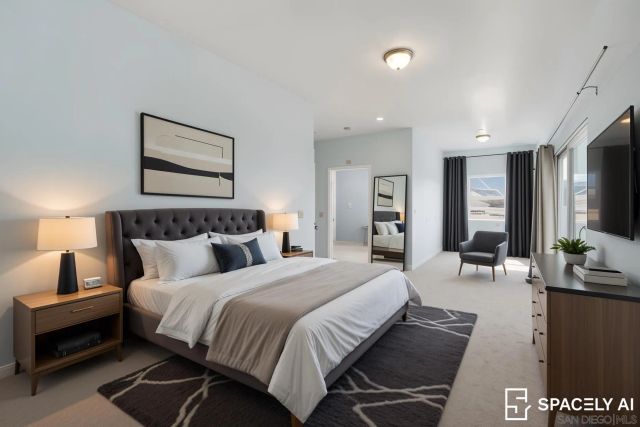 a bedroom with bed and window