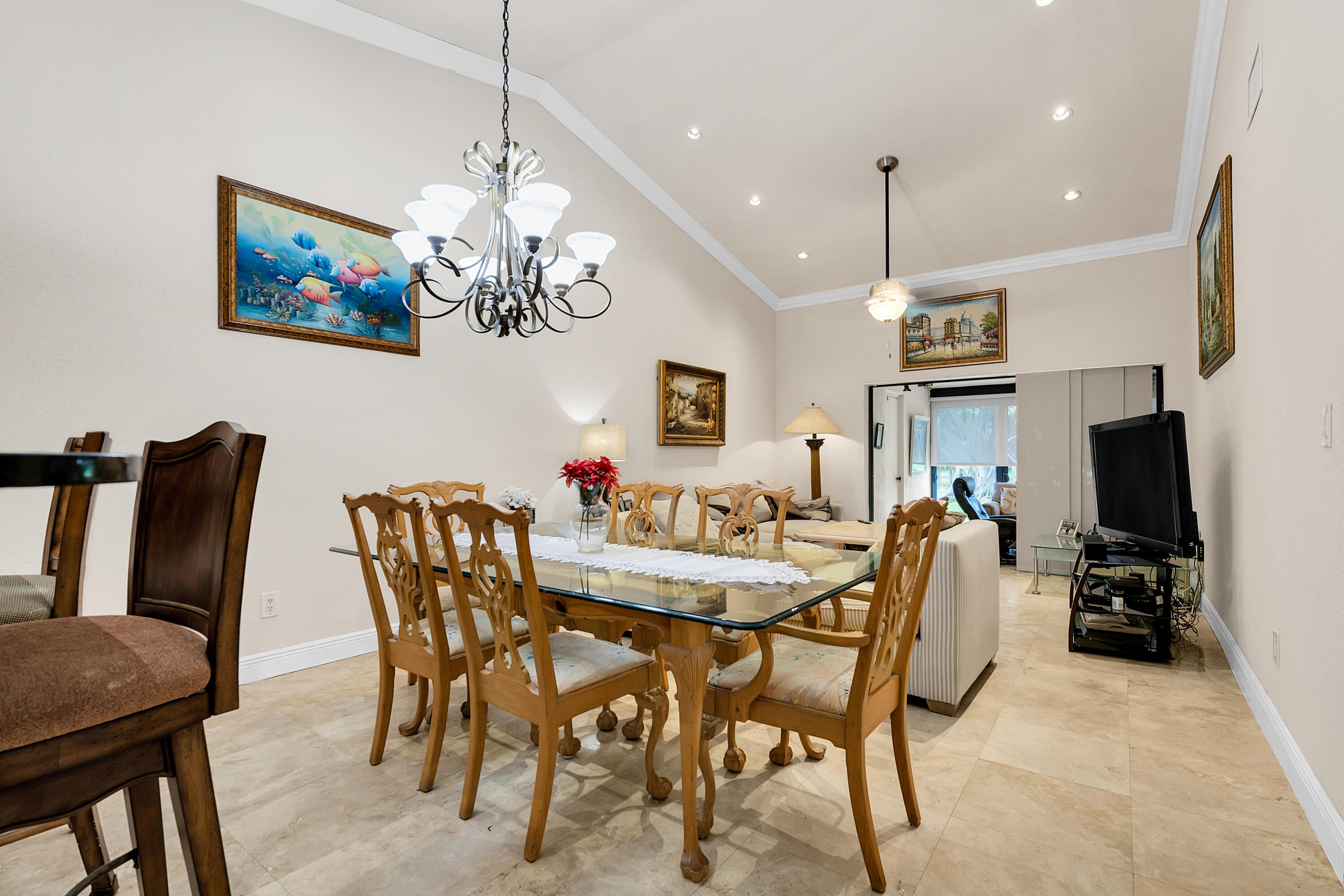8440 Boca Glades Boulevard East Boca Raton, FL 33434 - Photo 4 of 16 a view of a dining room with furniture