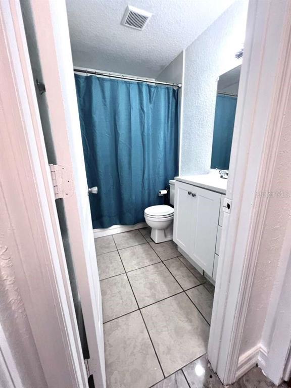 3409 Vorden Street New Port Richey, FL 34655 - Photo 26 of 41 a bathroom with a sink and a toilet
