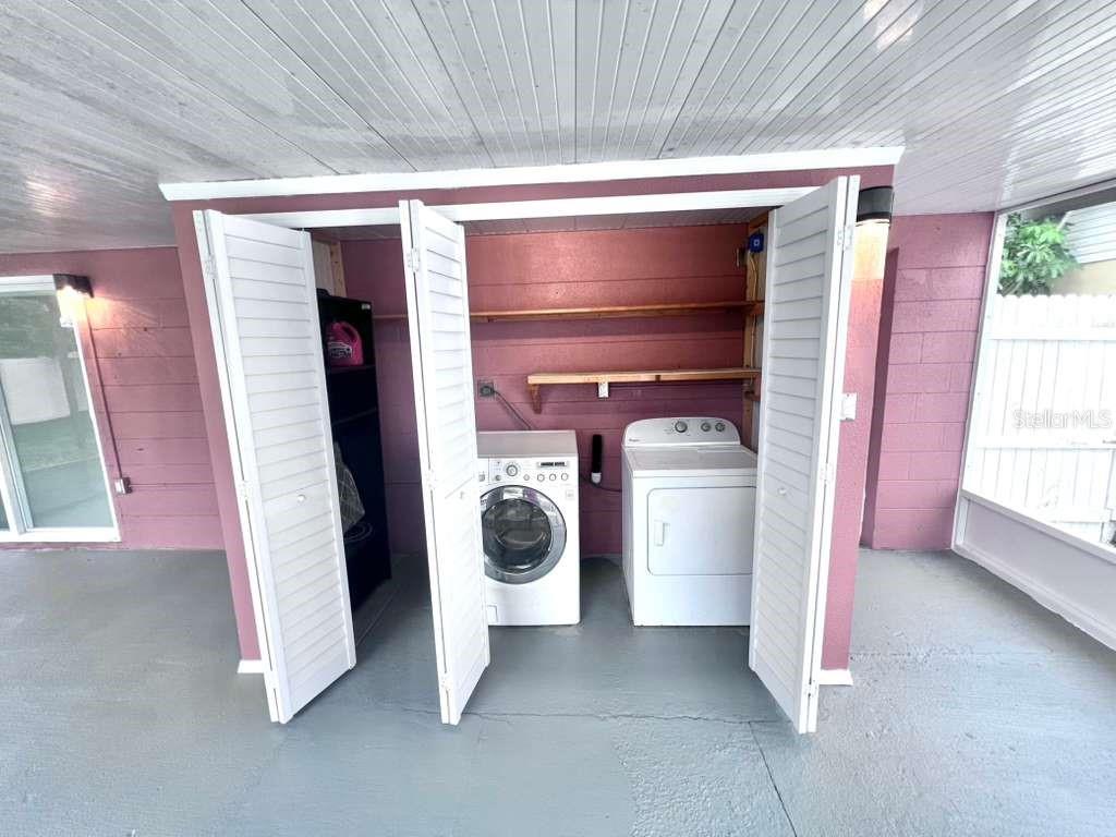 3409 Vorden Street New Port Richey, FL 34655 - Photo 33 of 41 a utility room with dryer and washer