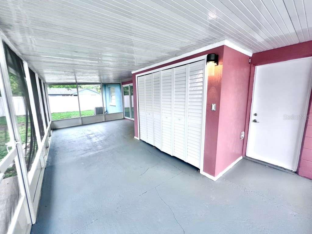 3409 Vorden Street New Port Richey, FL 34655 - Photo 36 of 41 a view of a room with large windows