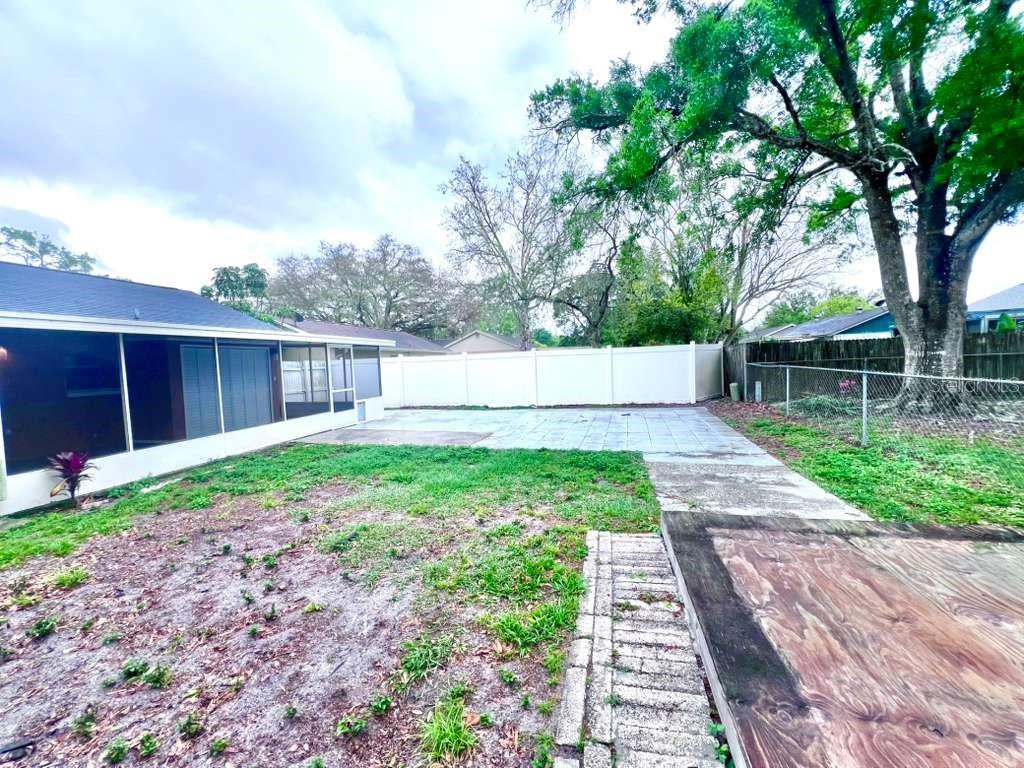 3409 Vorden Street New Port Richey, FL 34655 - Photo 37 of 41 a view of a backyard with a garden