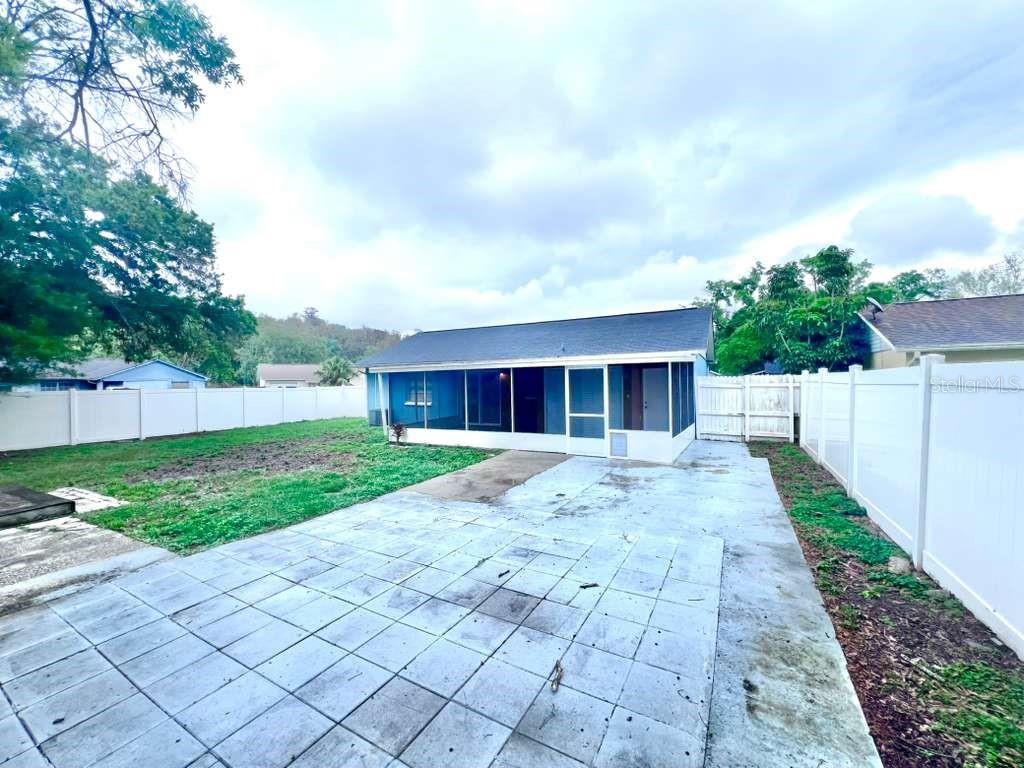 3409 Vorden Street New Port Richey, FL 34655 - Photo 40 of 41 a view of a house with a yard