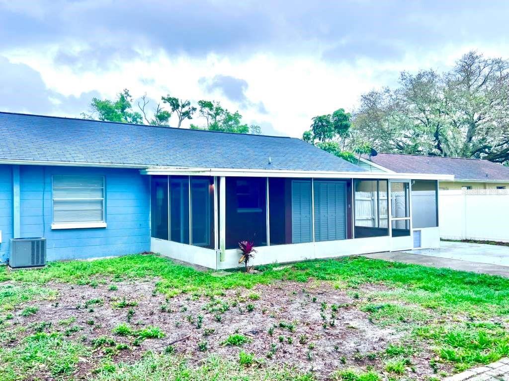3409 Vorden Street New Port Richey, FL 34655 - Photo 41 of 41 front view of a house with a yard and large tree