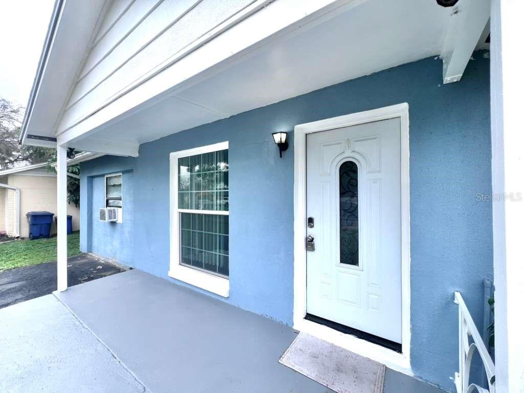 3409 Vorden Street New Port Richey, FL 34655 - Photo 8 of 41 a view of front door and porch
