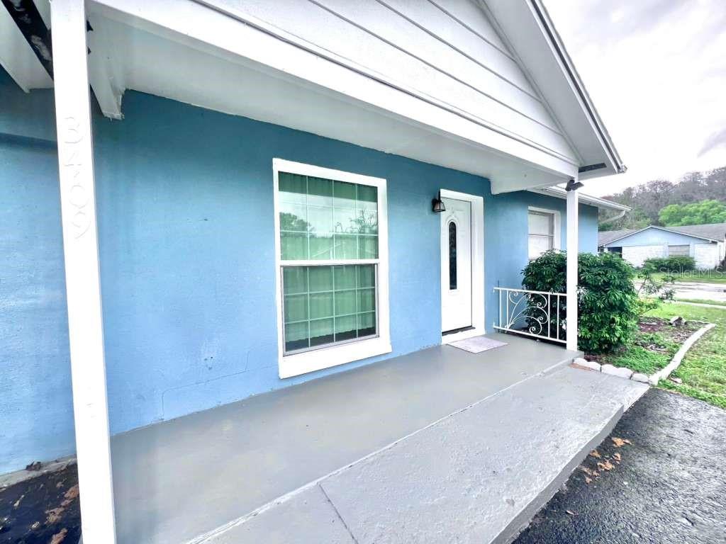 3409 Vorden Street New Port Richey, FL 34655 - Photo 9 of 41 a view of a house with porch and garden
