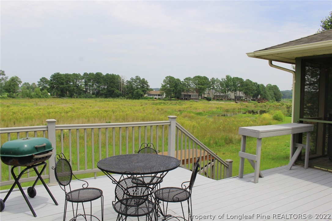 679 Cedar Point Vass, NC 28394 - Photo 17 of 18 a view of a chairs and table on the terrace