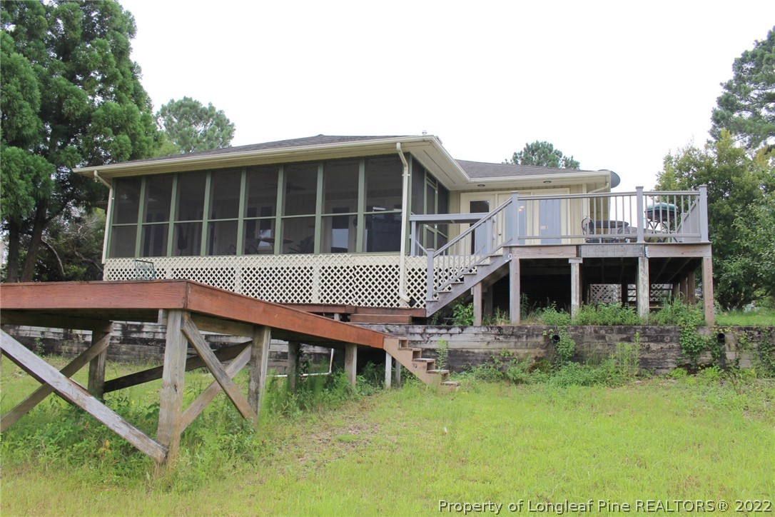 679 Cedar Point Vass, NC 28394 - Photo 2 of 18 a house view with a garden space