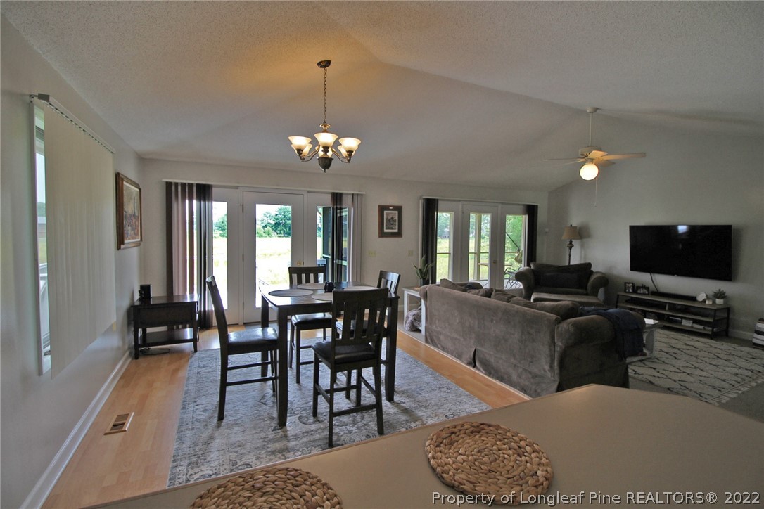 679 Cedar Point Vass, NC 28394 - Photo 5 of 18 a view of a dining room with furniture