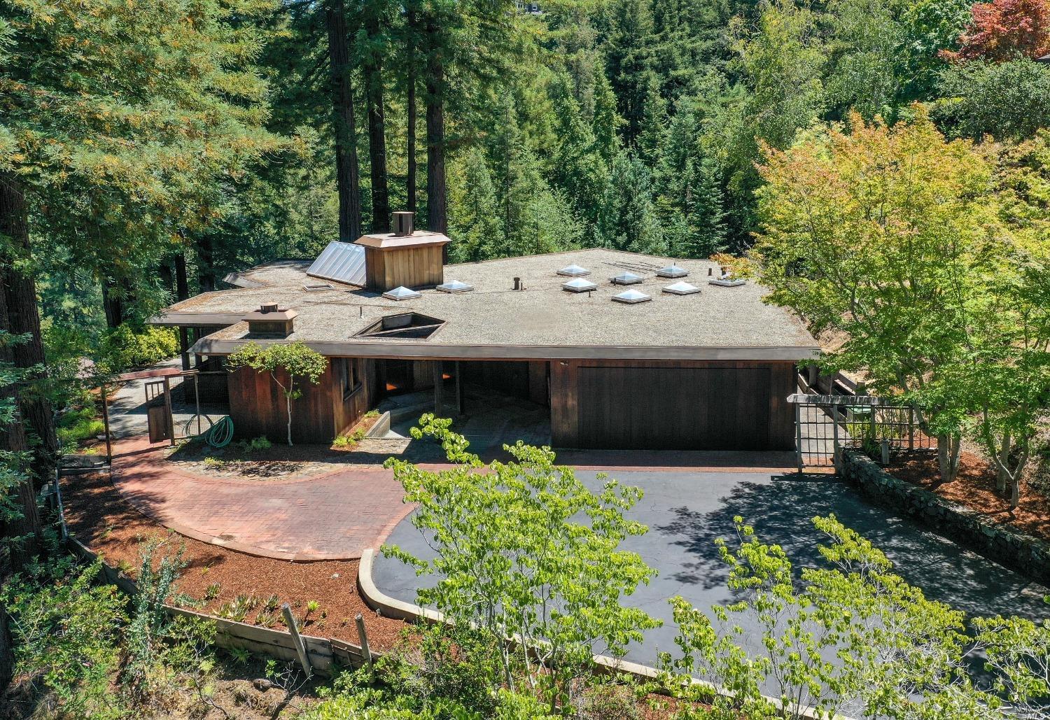 75 Idlewood Road Kentfield, CA 94904 - Photo 1 of 1 an aerial view of a house with yard table and chairs