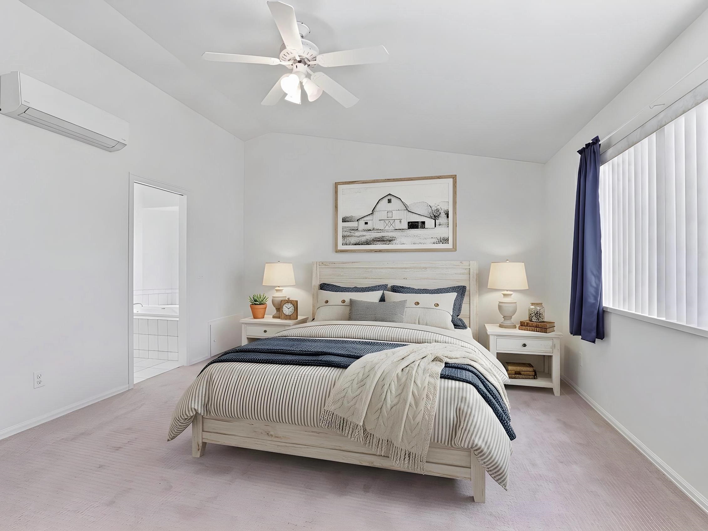 3082 Shadowbrook Court Grand Junction, CO 81504 - Photo 13 of 28 a bedroom with a bed and a chandelier
