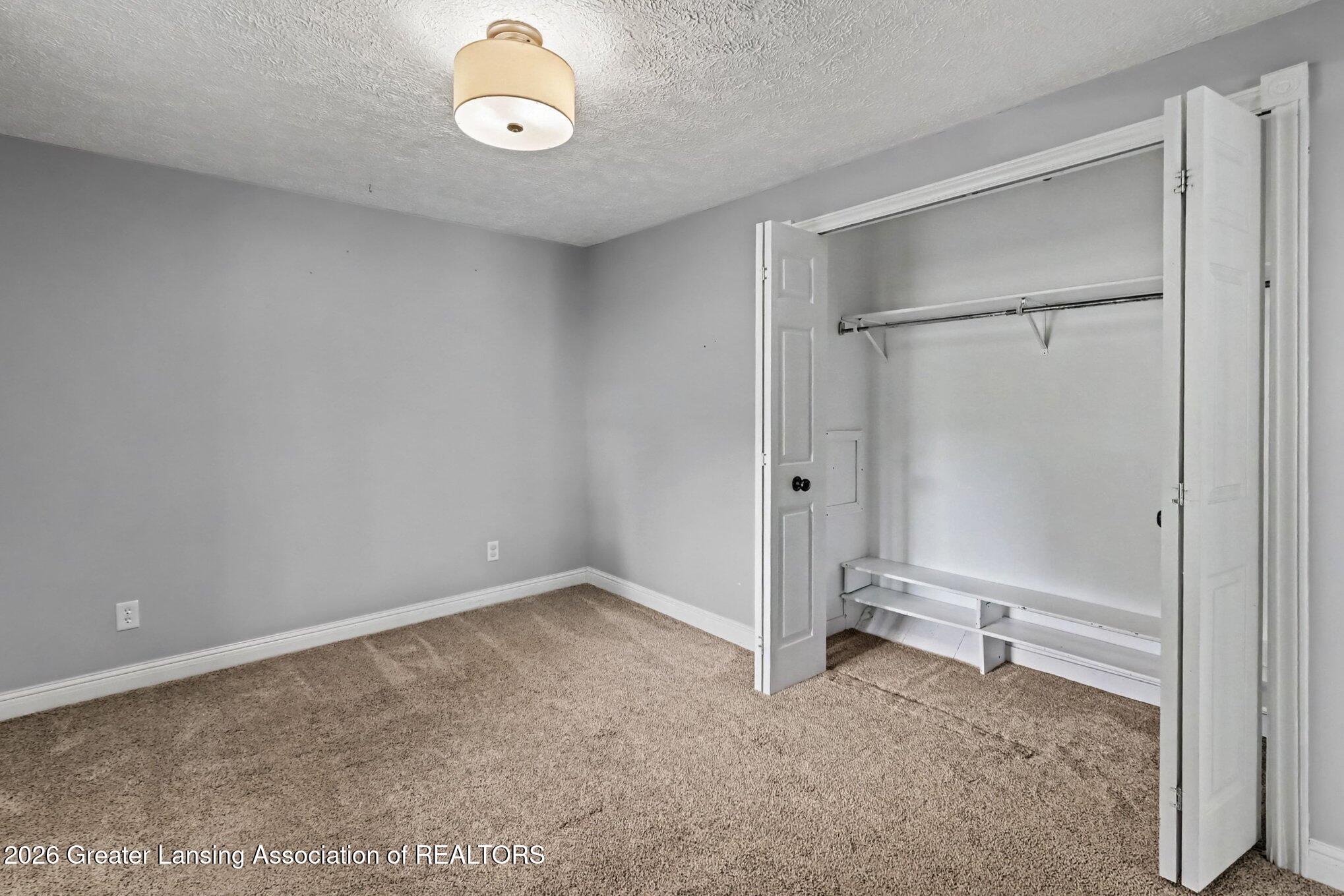 5490 West Howe Road Dewitt, MI 48820 - Photo 22 of 59 4th Bedrooom/Office