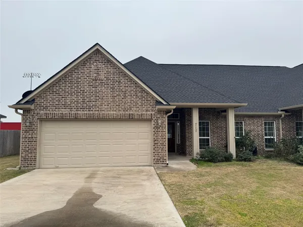 a front view of house with yard