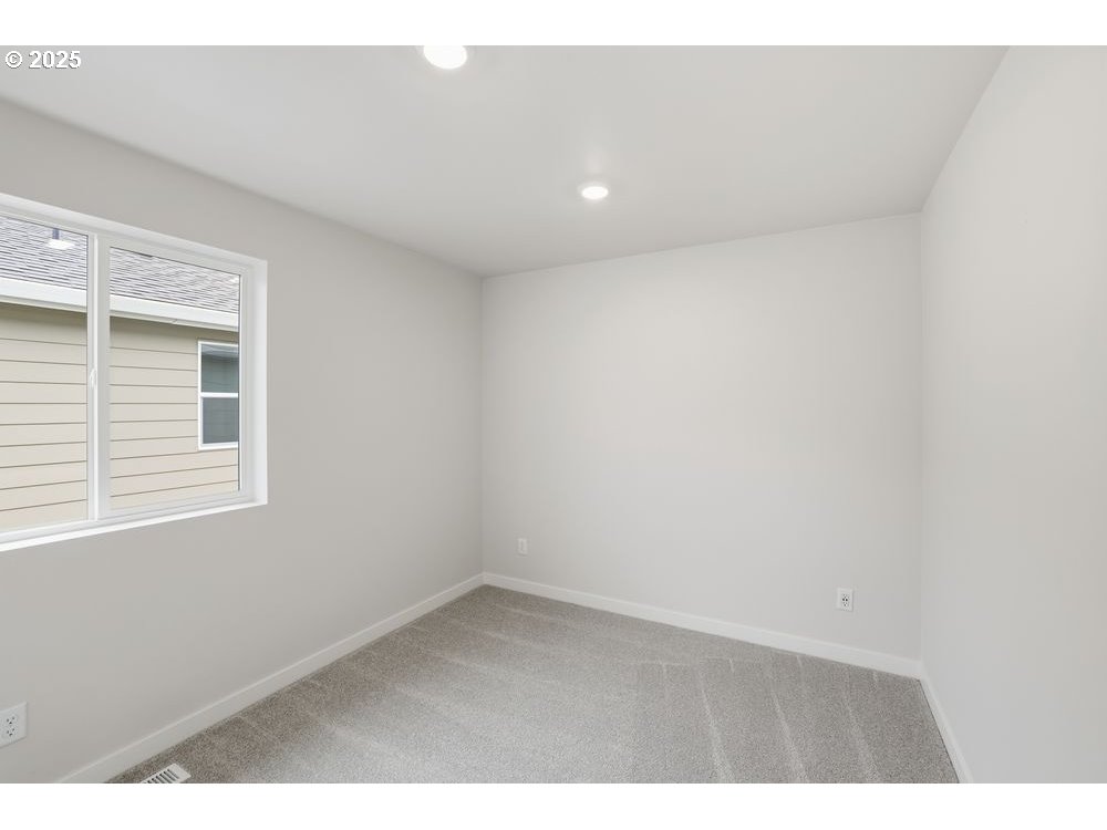 3736 Southwest 38th Street Gresham, OR 97080 - Photo 11 of 15 a view of an empty room with a window